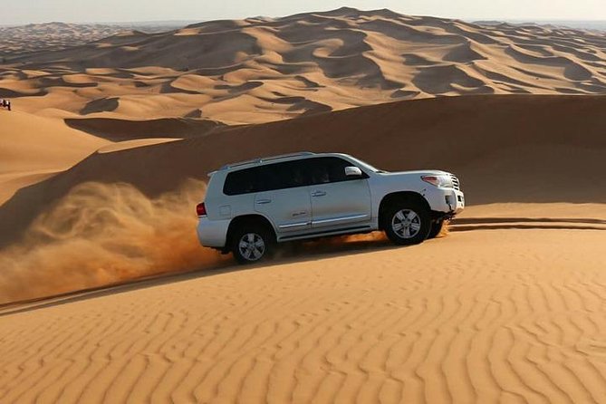 Dubai: Desert Safari with Camel Ride & Dune Bashing - 4x4 dune bashing: thrilling, controlled, and not for the fragile stomach