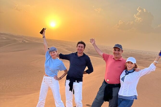 Dubai Desert Safari with Camel Ride, Sand surf, & BBQ Dinner - Riding Into the Arabian Red Dunes: Dune Bashing and Optional Machines
