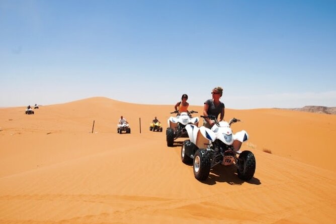 Dubai Desert Safari with Camel Riding, Sand Boarding,BBQ Dinner and 3 Live Shows - BBQ dinner at the camp, with unlimited non-alcoholic drinks
