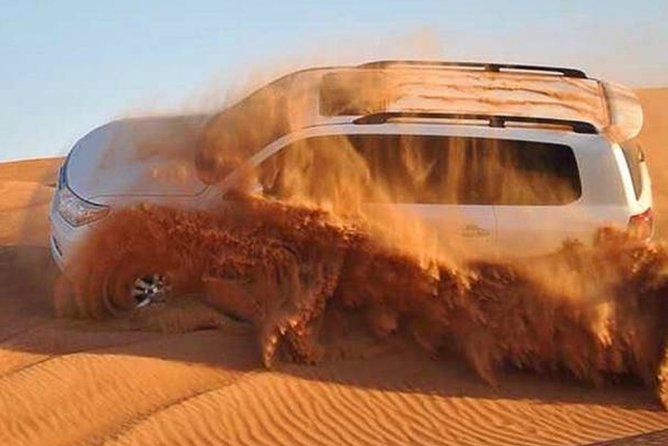Dubai Desert Safari with Camel Riding, Sand Boarding,BBQ Dinner and 3 Live Shows - Dubai hotel pickup and the Al Awir departure setup