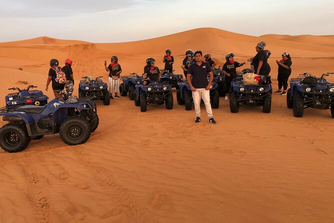 Dubai Desert Safari With Camp Activities and ATV Self Drive Quad Bike - Camel ride and sand boarding: the “try it once” classics