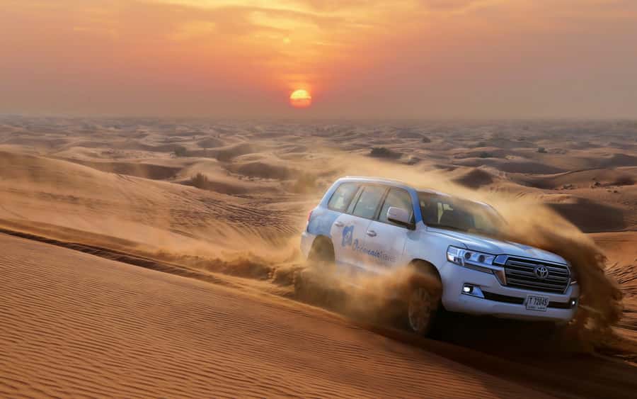Dubai: Desert Safari with Camp, Dinner, & Optional Overnight - Hotel pickup and the Dubai-to-desert handoff
