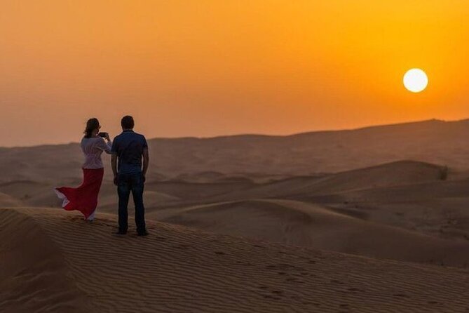 Dubai Desert Safari With Dinner And Live Shows - Camel ride at sunset, sandboarding, and photos that actually pay off