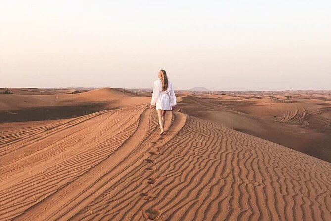 Dubai Desert Safari with Dinner, Camel Ride & Dune Bashing - Shows Under Light and Sound: Belly Dance, Tanoura, and Fire
