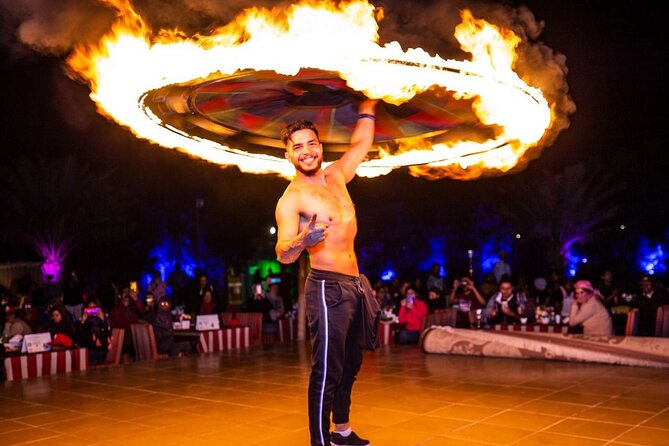 Dubai Desert Safari with dune bashing and Dinner - The show schedule: belly dancing, Tanura, and two fire shows
