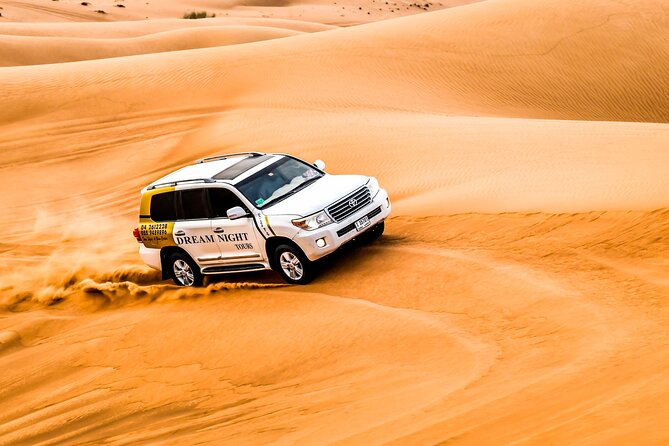 Dubai Desert Safari With Dune Bashing, Camel Ride & BBQ Dinner - Camp arrival at Dream Night Tours: welcome drinks and real downtime