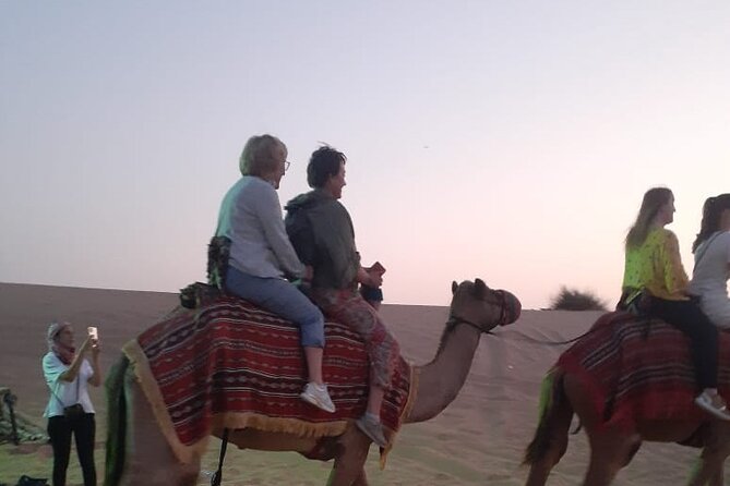 Dubai Desert Safari with Quad Bike, Camel Ride, Dinner and Shows - The Camp Stop: Photos, Arabic Dress, and Lounge Time
