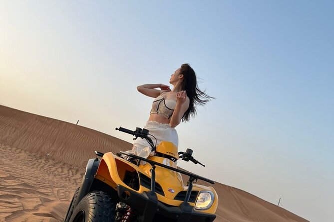Dubai Desert Safari with Quad Bike, sandboarding, live show & BBQ - Red sand, quad bikes, and a schedule that moves