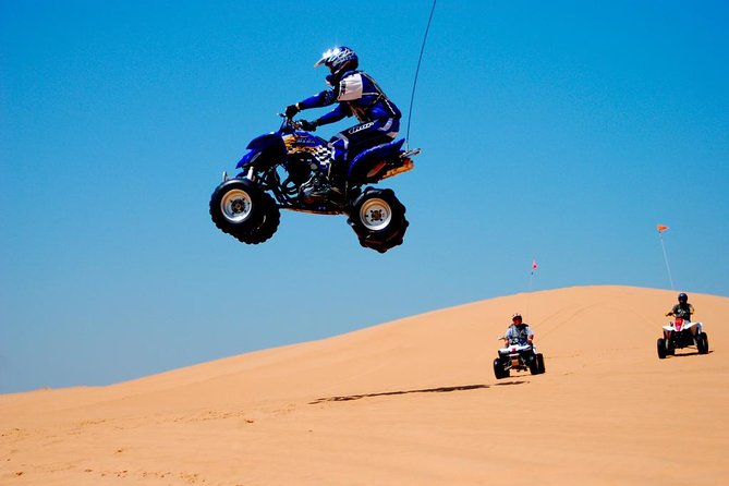 Dubai Desert Safari with Quad Biking - Quad biking at the Golden Desert Motorcycles Rental stop