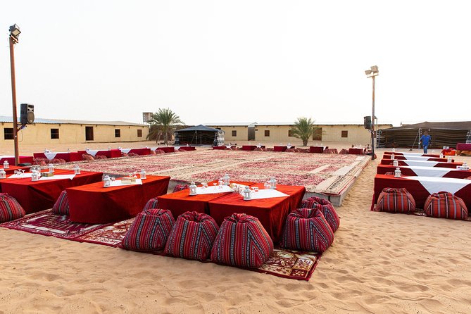 Dubai Desert Safari with Quads, BBQ Dinner, Camel ride, & Shows - Quad biking across the dunes: best value for adrenaline, but age limits apply