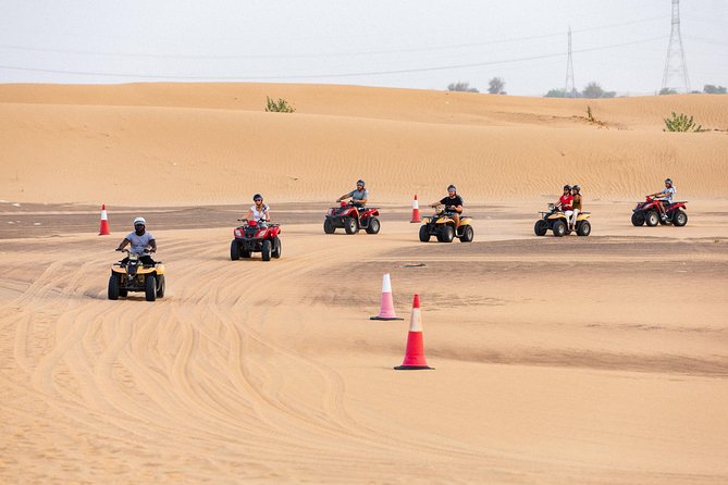 Dubai Desert Safari with Quads, BBQ Dinner, Camel ride, & Shows - BBQ dinner under the stars: what you get and what you should watch for