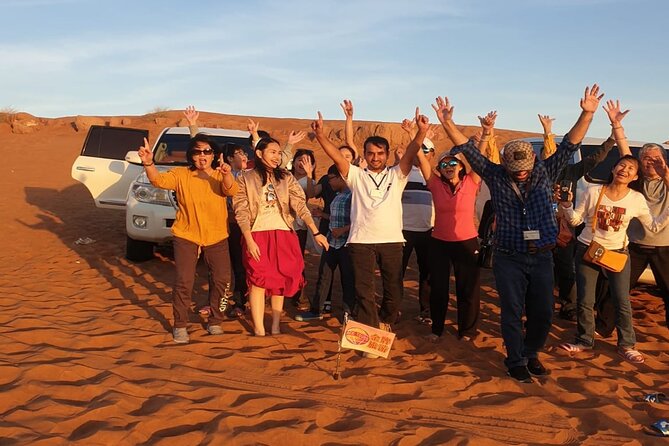 Dubai Desert Safari With Sandboarding & Camel Riding - Belly Dance, Tanura, and Fire Shows Under the Stars