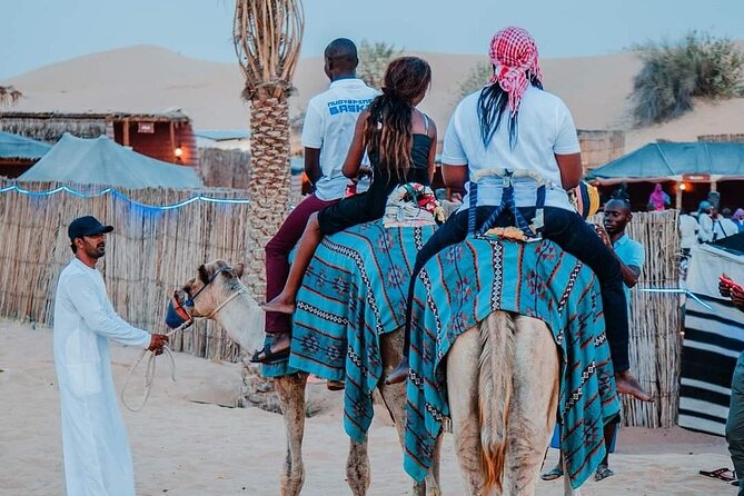 Dubai Desert Safari With Sandboarding & Camel Riding - Sandboarding on the Big Red Dunes (Not Just a Photo Op)