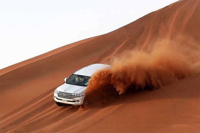 Dubai Desert Safari with Self Drive Quad Biking & Camel Riding - Sandboarding Slides and the Calm Reset in Between