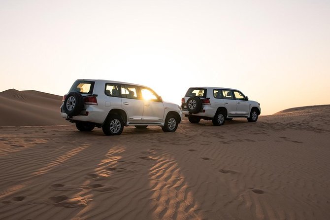 Dubai Desert Trail: Guided Quad/Polaris ATV & Red Dunes Safari - Sandboarding and Camel Ride, Then Sunset Photos for Afternoon Tours