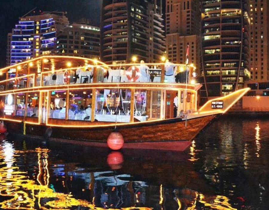 Dubai: Dhow Dinner Cruise on Creek or Marina with Live Shows - Sunset Views Over Dubai Creek and Marina Skyscrapers