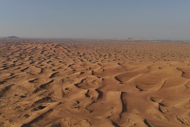 Dubai: Dune Buggy Safari and Camel Ride with Transportation - Safety gear, rules, and the real deal on self-driving risk