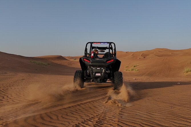 Dubai: Dune Buggy Safari and Camel Ride with Transportation - Sunset colors over red dunes, and why guides matter for photos