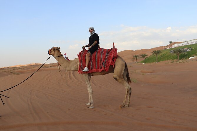 Dubai: Dune Buggy Safari and Camel Ride with Transportation - Driving the Polaris 1000cc RZR sport buggy, and switching seats mid-ride