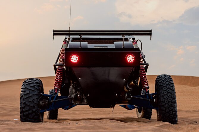 Dubai Dune Buggy Safari Tour in Red Dunes Options - Desert Camp Time: Sandboarding, Camel Rides, and Optional BBQ