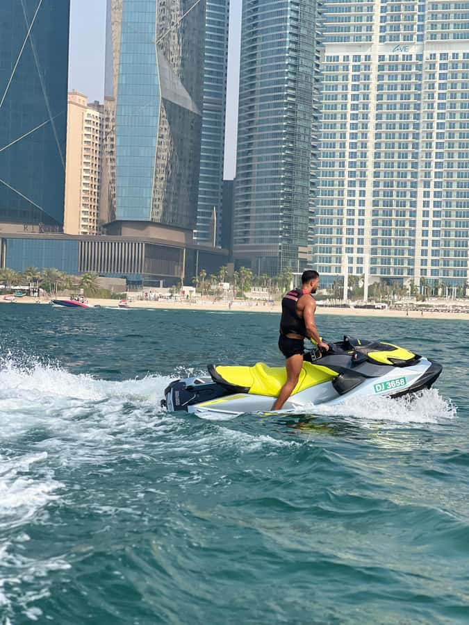 Dubai East: Guided JetsKi Ride with Sound System! - East Marina Sights: Dubai Eye, Palm Jumeirah, Atlantis
