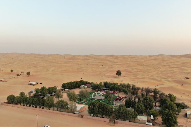 Dubai: Evening Desert Safari, Camel Ride, Shows & BBQ Dinner - Sunset photos and the Kandura and Abbaya costume moment