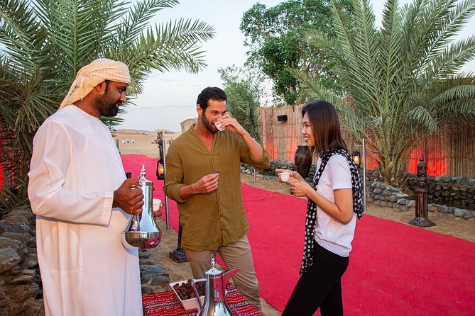 Dubai Evening Desert Safari: Sandboarding, BBQ, Camel Ride & more - Entertainment schedule: Tanoura, belly dance, fire, and camp music energy
