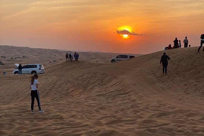 Dubai Evening Desert Safari with ATV Quad Bike & Dinner - Live shows at the camp: belly dance, tanoura, and fire