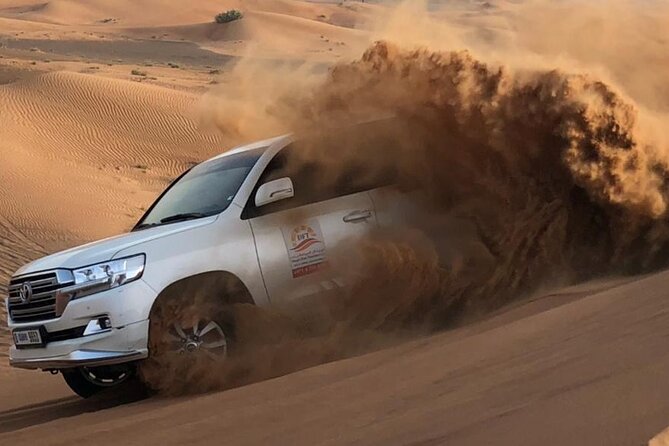 Dubai Evening Desert Safari with BBQ & Live Entertainment - Air-Conditioned Pickup, Sunset Photos, And Camp Arrival