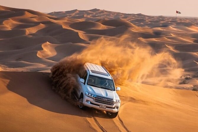 Dubai Evening Desert Safari with BBQ & Live Entertainment - Sandboarding, Camel Ride, Henna, And Falcon Photo Moments