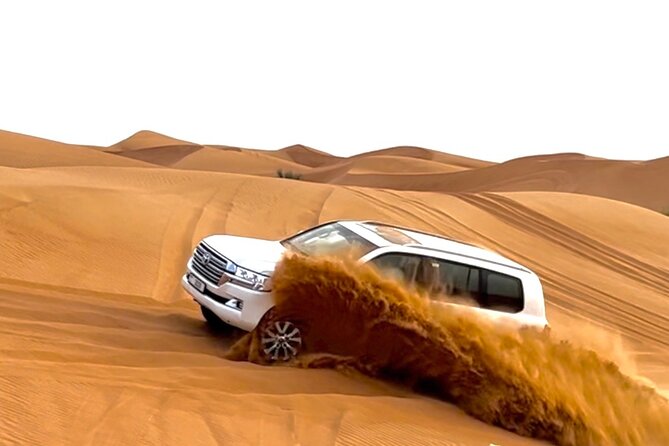 Dubai Evening Desert Safari With Quad Bike and BBQ Dinner - The Dubai sightseeing route between desert and dinner