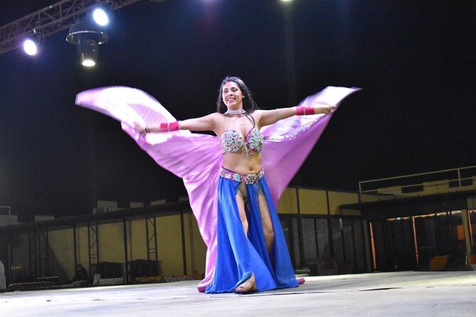 Dubai Evening Desert Safari With Transfers Dune Bashing & Dinner - Live dance and fire show lineup, plus shisha and star gazing