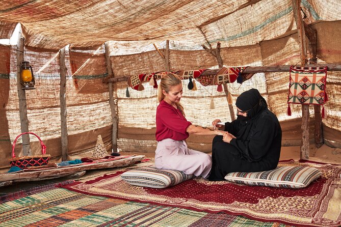 Dubai Evening Heritage Safari by Vintage G Class Al Marmoom Oasis - Falcons, Arabic attire, and camp entertainment under night skies