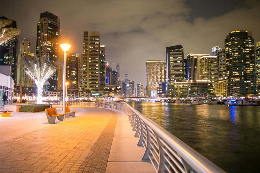 Dubai: Evening Tour and Burj Khalifa Entrance Ticket - Madinat Jumeirah after dark: canals, wind towers, and a slower pace