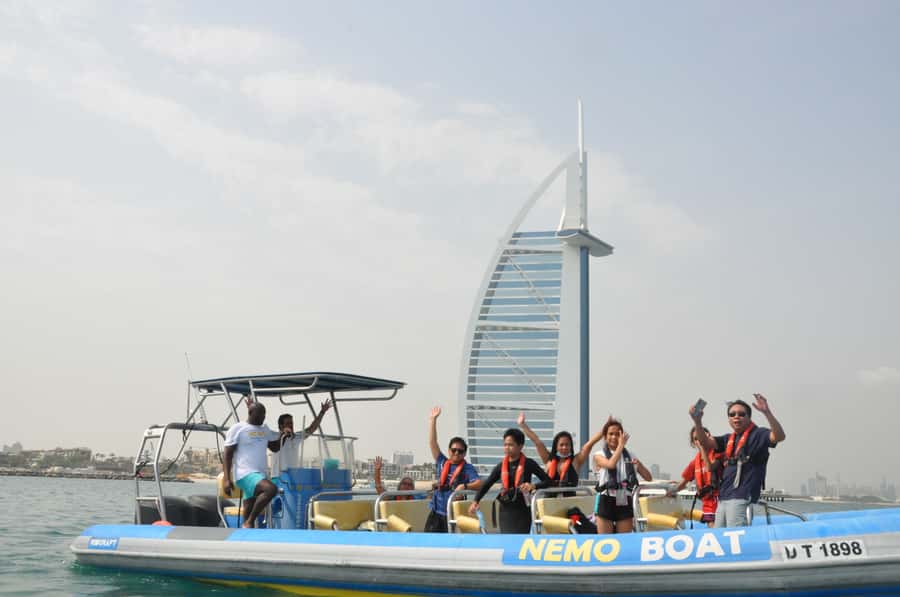 Dubai: Guided Speedboat Tour with City Sights & Ice Cream. - Ice cream at the end, plus a realistic view of what is included
