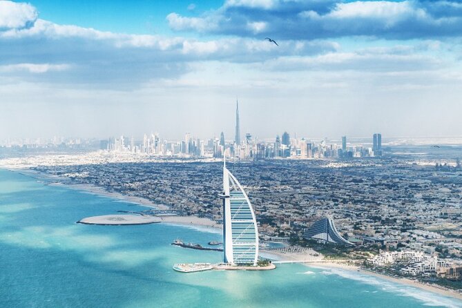 Dubai Half Day City Tour and Sightseen with pick up - Burj Al Arab From the Road, Then Al Qasr Palace Pass-By