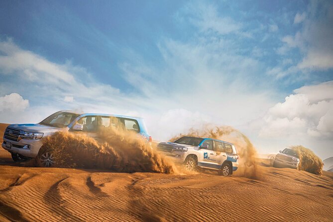 Dubai: Half-Day Desert Safari, Camels, Quad Bike & Refreshments - Lahbab Desert Arrival: Tea, Dates, Restrooms, and Tyre Prep