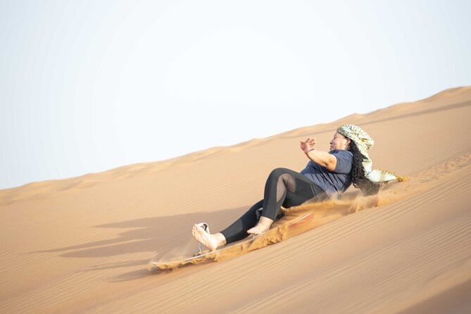 Dubai Half-day Red Dunes bashing with Sandboarding, Camel &Falcon - Camel Ride in the Desert, Slow After the Rush