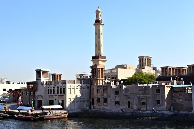 Dubai Half Day Tour with Entry Ticket to Burj Khalifa at the Top - Old Dubai at Al Fahidi Fort: the quiet counterweight