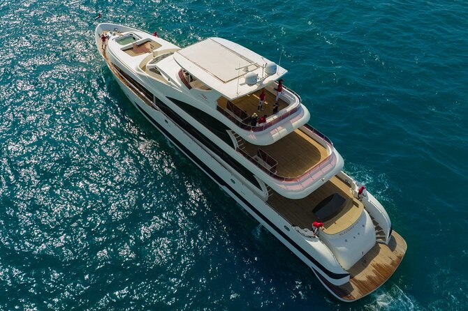 Dubai Harbour Super Yacht Experience with gourmet & Drinks - Landmark Run-Down: Ain Dubai, Bluewaters, and Palm Jumeirah From the Water