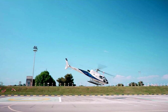 Dubai Helicopter Experience with Sightseeing Options - Burj Khalifa from above: skyline context, not just a single tower