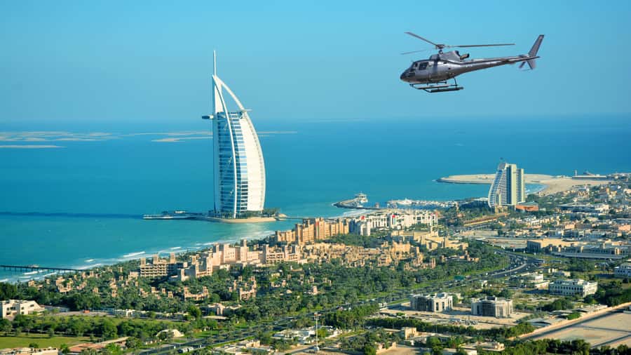 Dubai: Helicopter Ride, Desert Safari, Camels & Refreshments - Dune Bashing in a 4WD: Thrill With a Technical Side