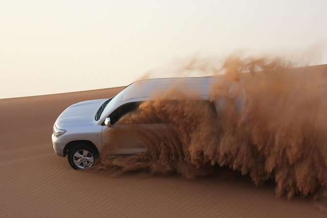 Dubai High Red Dunes Extreme Desert Safari Adventure with BBQ Dinner - BBQ Dinner and Unlimited Soft Drinks, Plus What Costs Extra