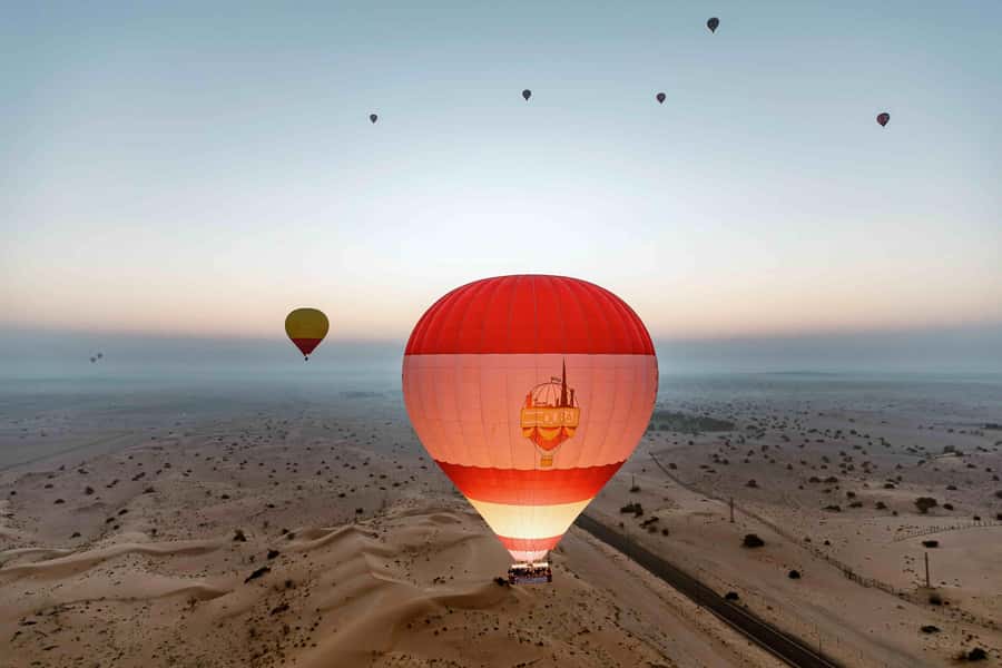 Dubai: Hot Air Balloon, Desert Safari, and Quad Biking Tour - Balloon Inflation, Pilot Instructions, and the Falcon Timing