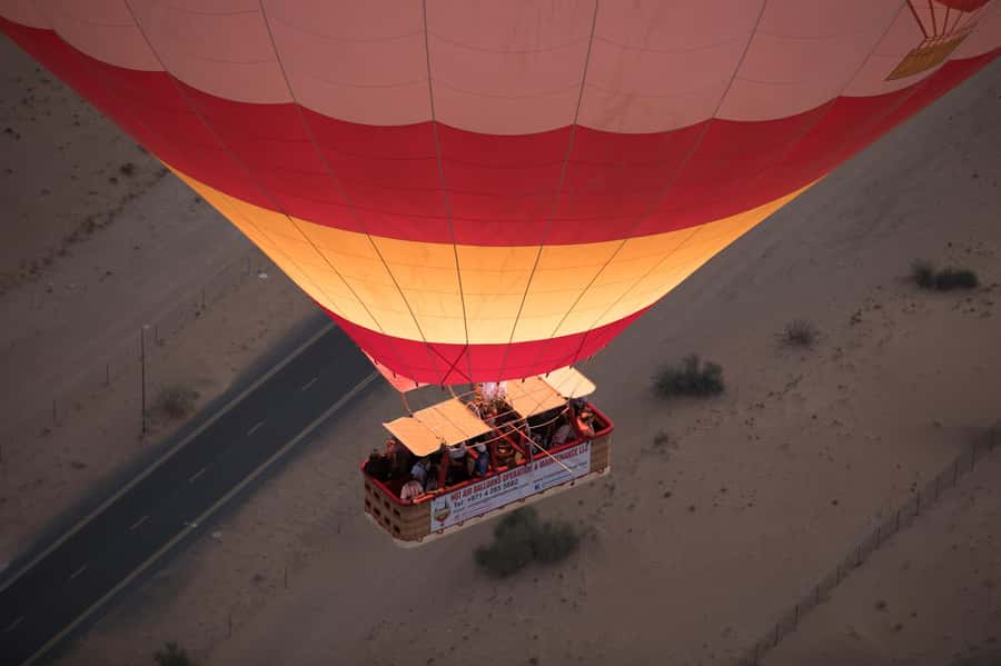 Dubai: Hot Air Balloon Ride with Camel Ride & Falcon Show - On the sand: balloon inflation and your first view of the dunes