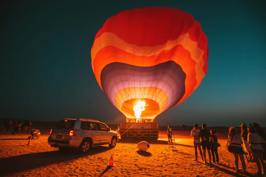 Dubai: Hot Air Balloon Ride with Camel Ride & Falcon Show - The Margham Desert morning flow: pickup, drive, and safety briefing