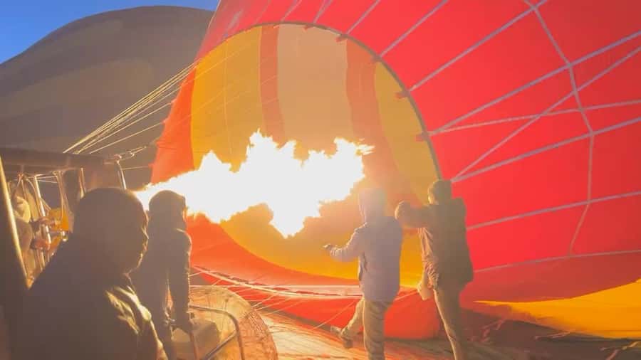 Dubai: Hot Air Balloon with Camel, ATV, & Horse Ride Options - The balloon setup: inflation, safety briefing, and coffee in the cold part of morning