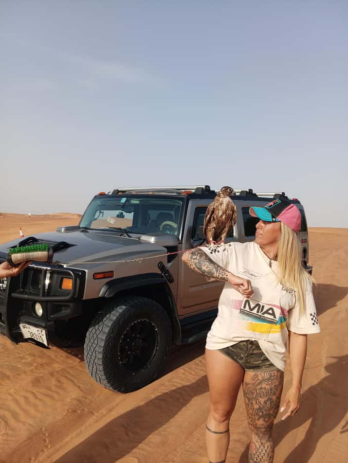 Dubai Hummer Safari Adventure & Traditional Dress Photoshoot - Camel ride, henna painting, and the camp-side traditions