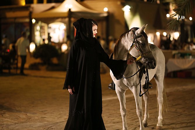 Dubai: Luxury Desert Fortress Dinner, Camel Ride & Live Shows - Live entertainment: belly dancing, Tanoura, and fire performance