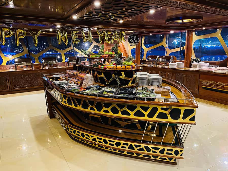 Dubai Marina: Dinner Cruise in a Traditional Boat - Buffet Dinner and Welcome Drinks, Plus What the Live Entertainment Adds
